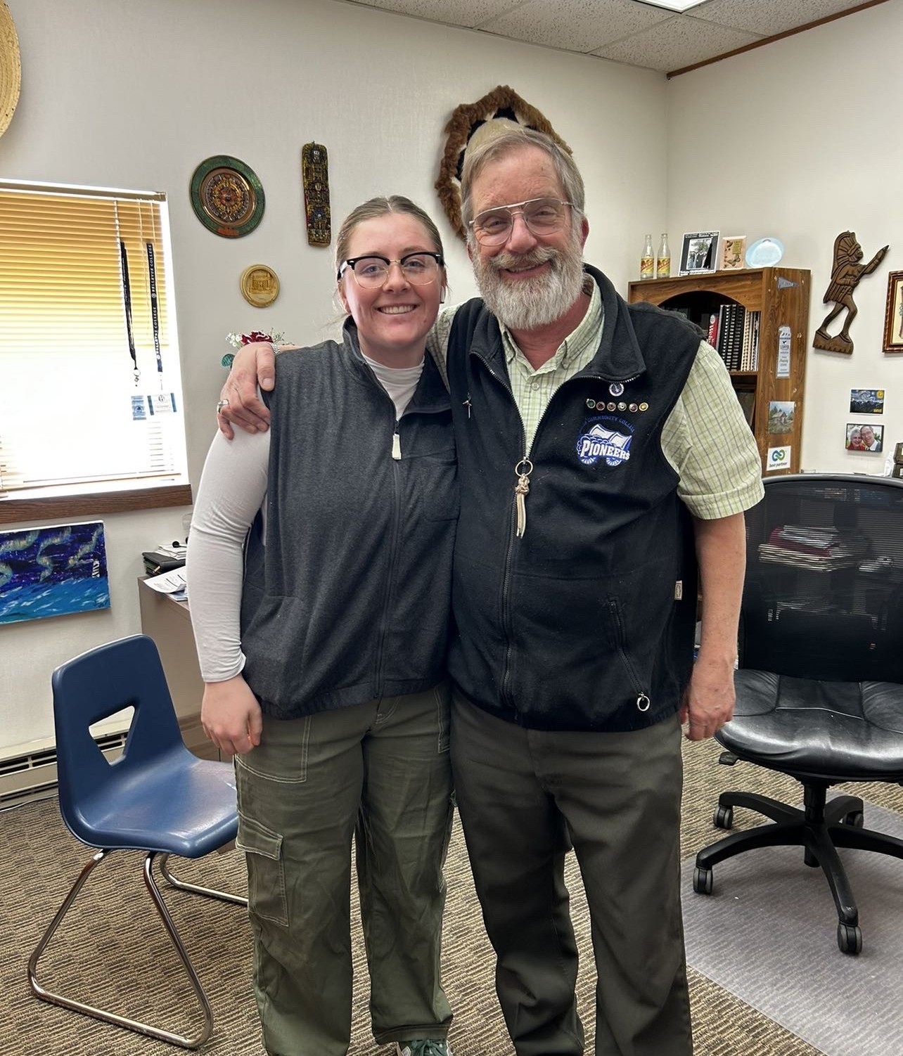 Image of two adults smiling