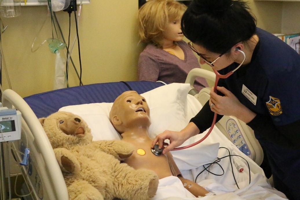 MCC Nursing Student practicing hands-on procedures in class 