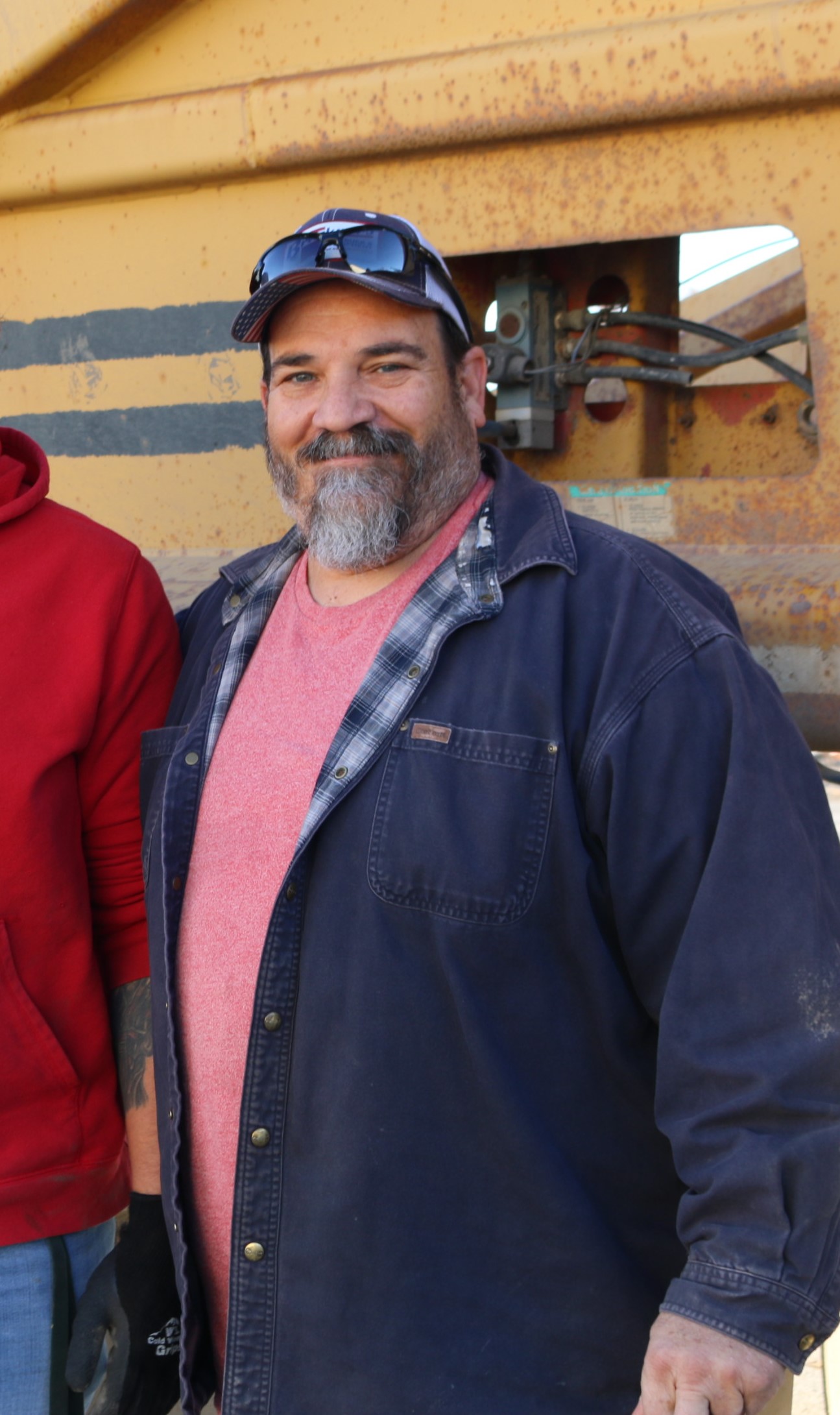 Adult in hat standing